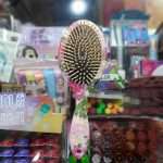 شانه طرح دار پلاستیک دانه چوبی